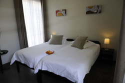 Comfortable beds at the Elegant Guesthouse Namibia