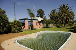 relax by the pool at the quinta safari house in buitepos namibia